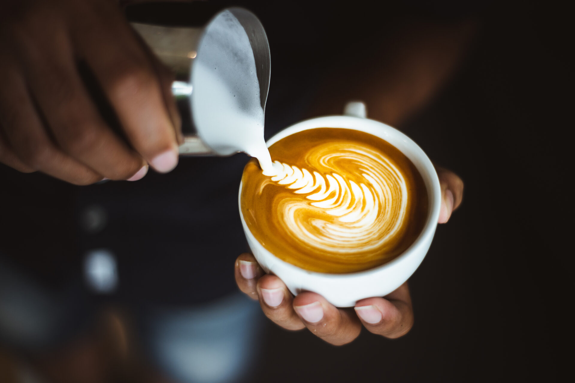 Latte art being poured